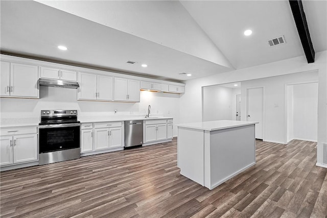 kitchen with white cabinets, dark hardwood / wood-style floors, sink, and stainless steel appliances