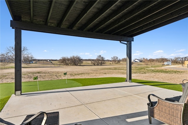 view of patio with a rural view