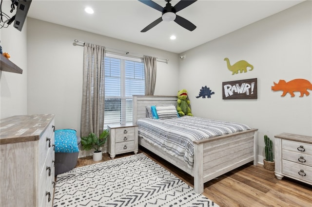 bedroom featuring recessed lighting, baseboards, ceiling fan, and light wood finished floors