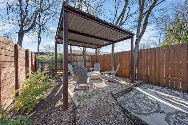 view of patio with a fire pit