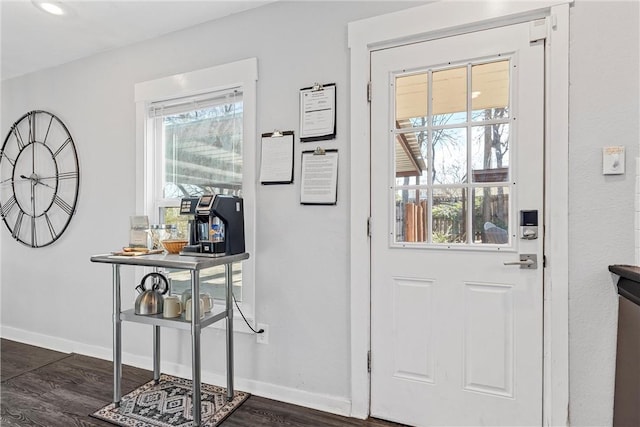 doorway to outside with dark hardwood / wood-style flooring