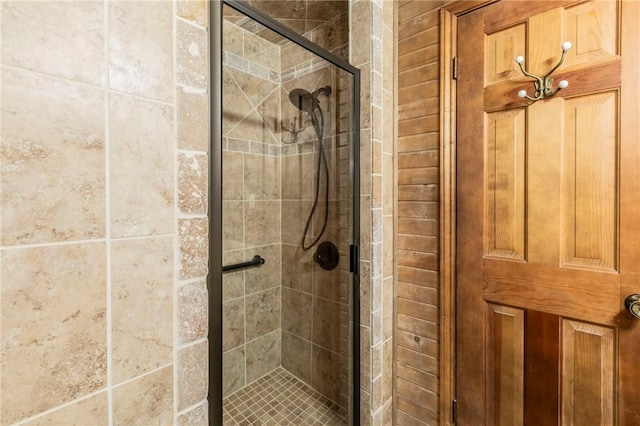 bathroom featuring an enclosed shower