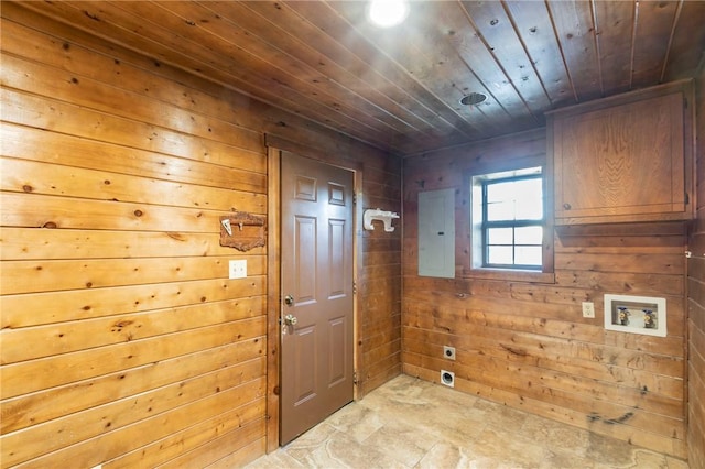 laundry room with wooden walls, washer hookup, electric panel, electric dryer hookup, and wooden ceiling