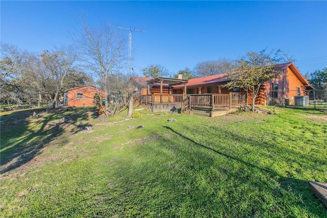 view of yard with a wooden deck