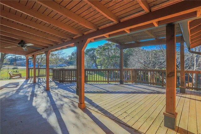 wooden deck with ceiling fan