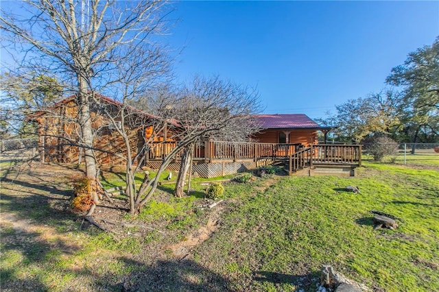 view of yard with a deck