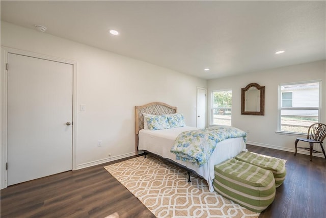 bedroom featuring dark wood-type flooring