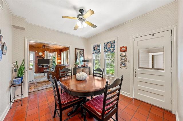 dining space featuring tile patterned flooring and ceiling fan