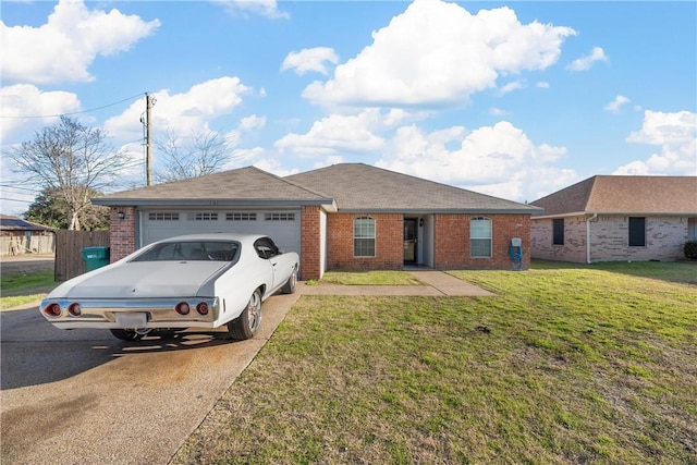 single story home featuring a garage and a front lawn