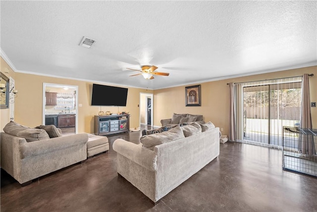 living room with a textured ceiling, ceiling fan, ornamental molding, and sink