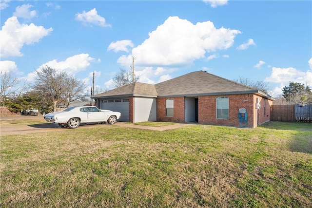 single story home featuring a front yard and a garage