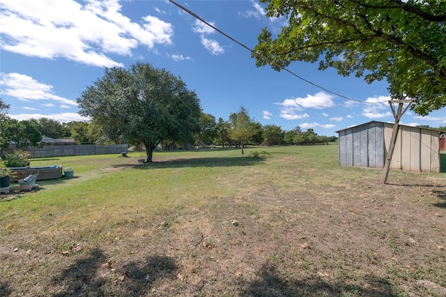 view of yard featuring a storage shed