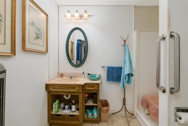 bathroom with vanity and tile patterned floors