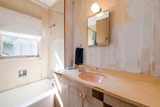 bathroom featuring vanity and shower / bathtub combination