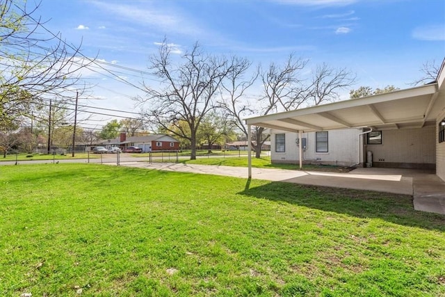 view of yard featuring a carport