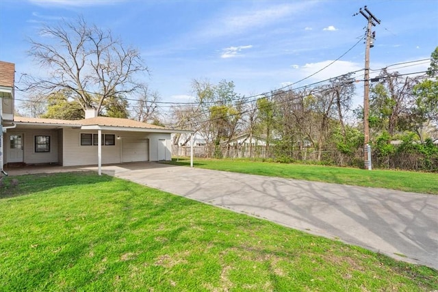 view of yard with a carport