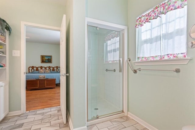 bathroom featuring an enclosed shower