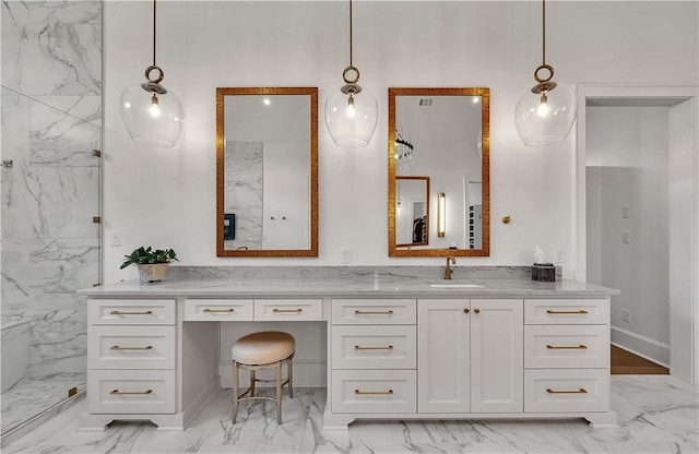 bathroom featuring vanity and a shower