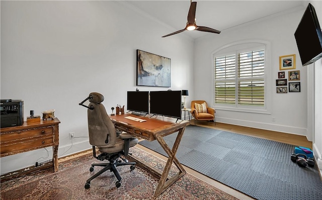 office area with ceiling fan and hardwood / wood-style floors