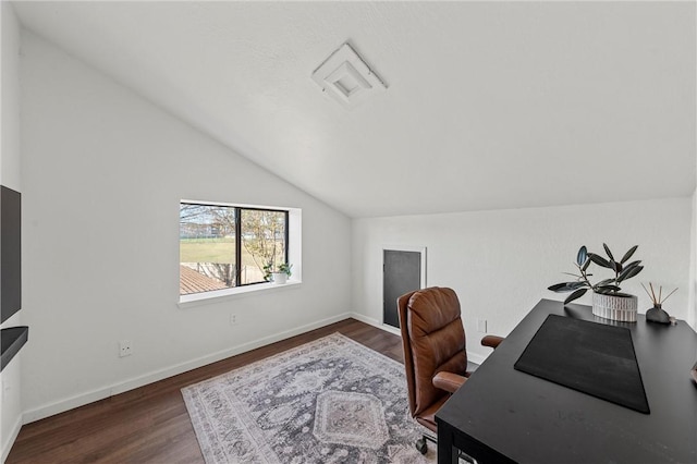 office space with dark wood-type flooring and vaulted ceiling