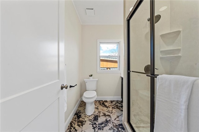 bathroom with toilet and an enclosed shower