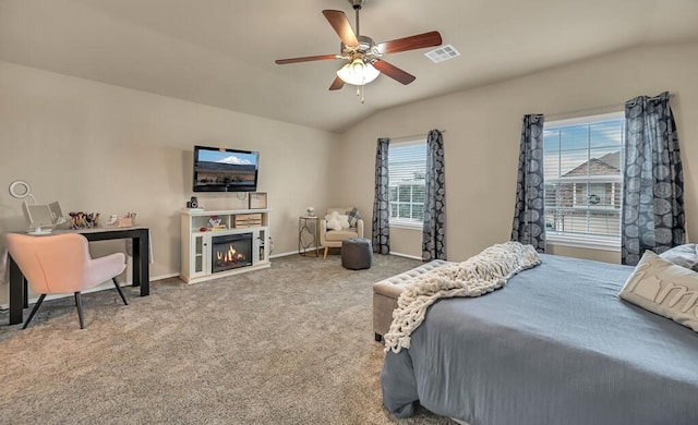 bedroom featuring carpet, ceiling fan, and lofted ceiling