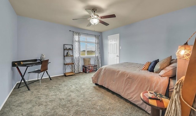 bedroom with ceiling fan and carpet floors