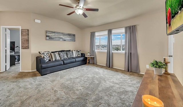 living room with carpet flooring, ceiling fan, and vaulted ceiling