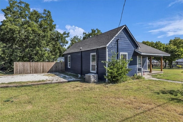 view of property exterior featuring a yard