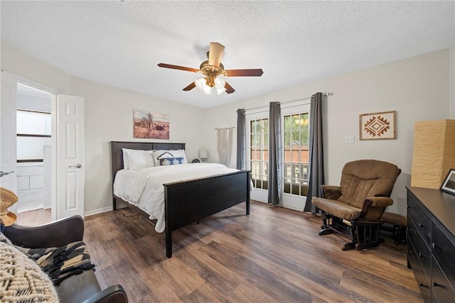 bedroom featuring a textured ceiling, ceiling fan, and dark hardwood / wood-style floors