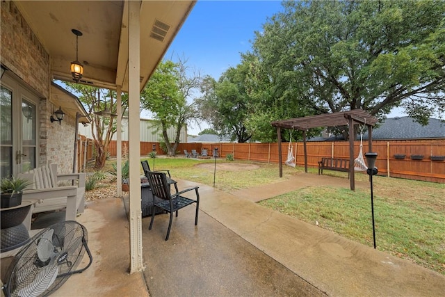 view of patio featuring a pergola