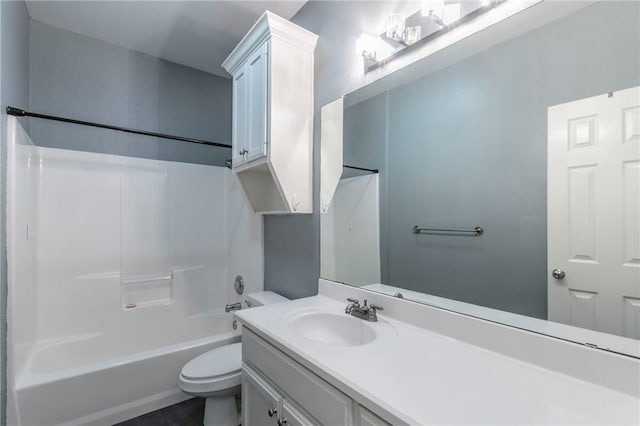 full bathroom featuring vanity, toilet, and tub / shower combination