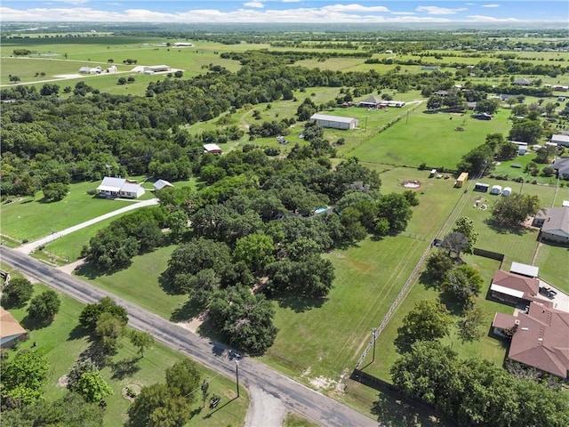 birds eye view of property featuring a rural view