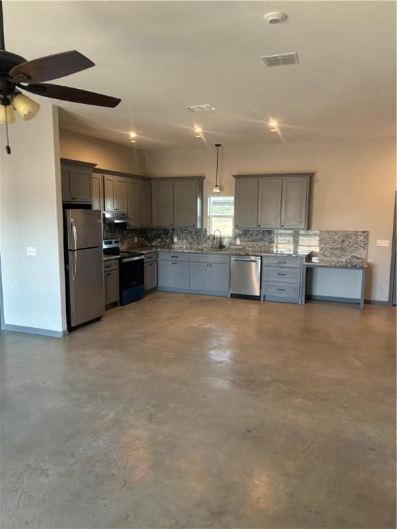 kitchen with decorative light fixtures, stainless steel appliances, sink, ceiling fan, and gray cabinetry