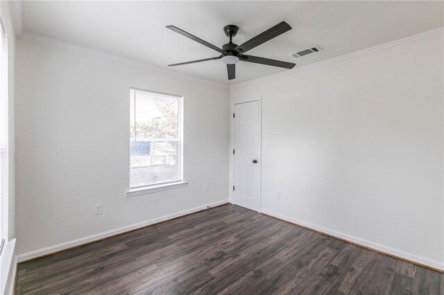 unfurnished room featuring crown molding, ceiling fan, and dark hardwood / wood-style floors