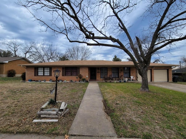 ranch-style home featuring a garage, a front yard, and a porch