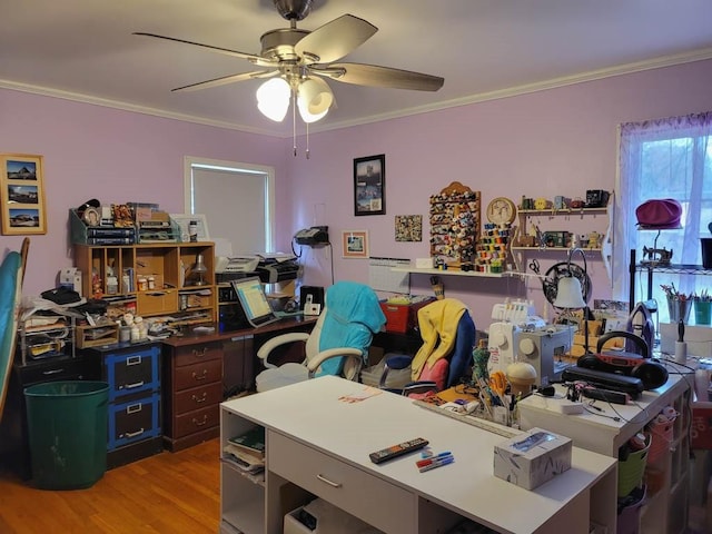 office with ceiling fan, ornamental molding, and light wood-type flooring