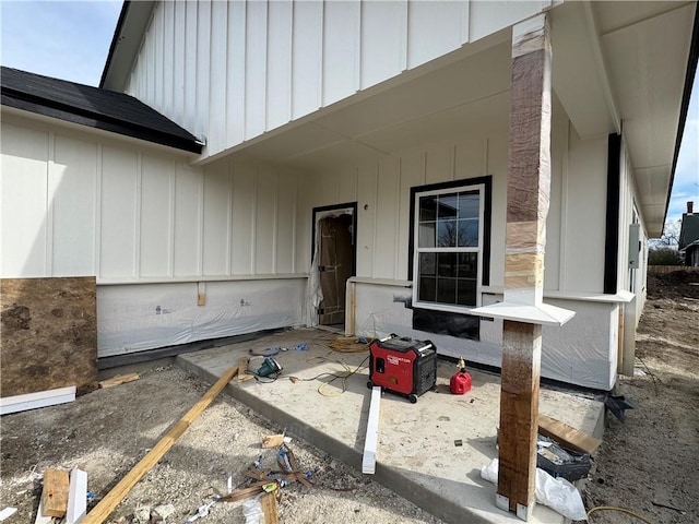 property entrance featuring a patio