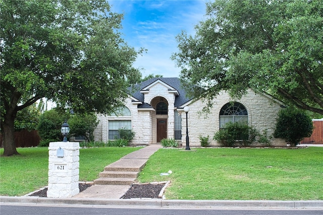 view of front of house with a front yard