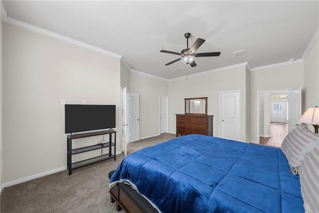 carpeted bedroom featuring ceiling fan and ornamental molding