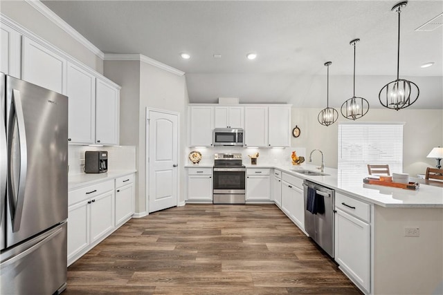 kitchen featuring sink, stainless steel appliances, dark hardwood / wood-style flooring, decorative light fixtures, and white cabinets