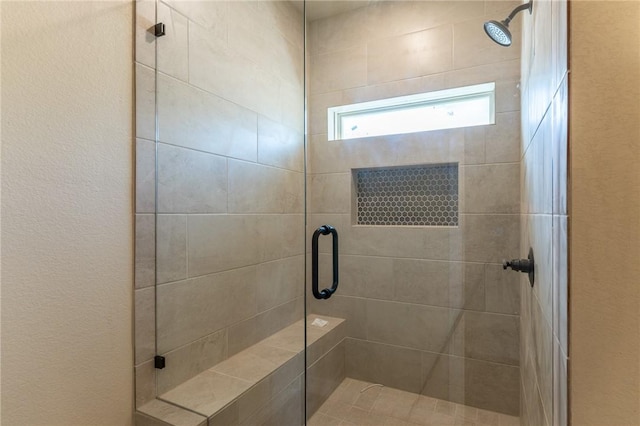 bathroom featuring walk in shower