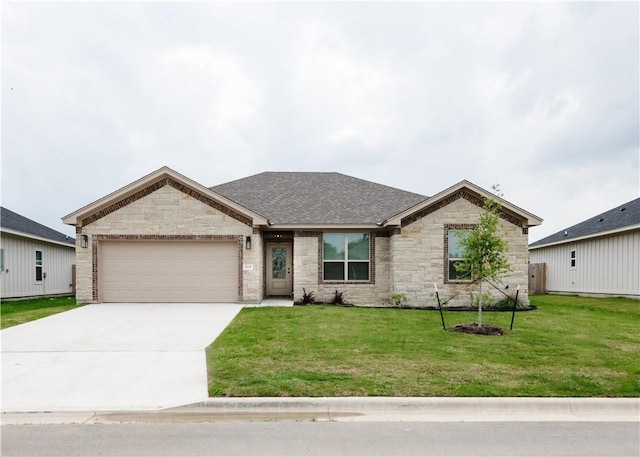 ranch-style house featuring a front yard and a garage