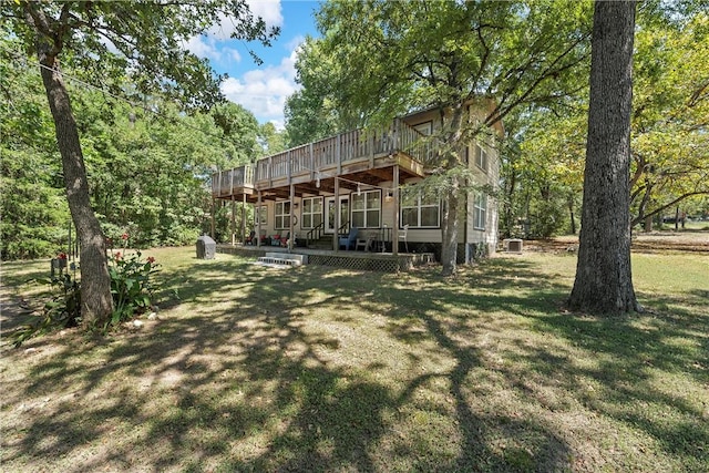 view of yard with a wooden deck