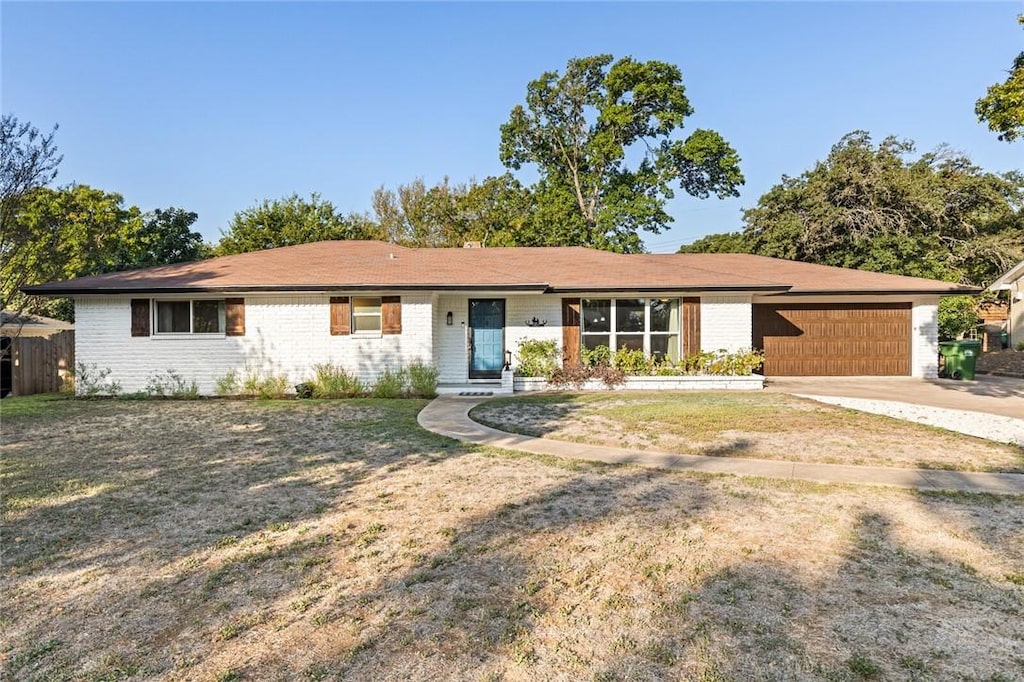 single story home with a garage