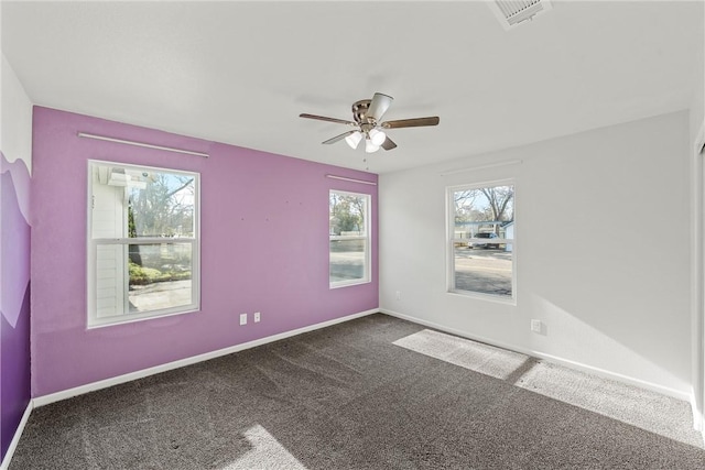 empty room with carpet floors and ceiling fan