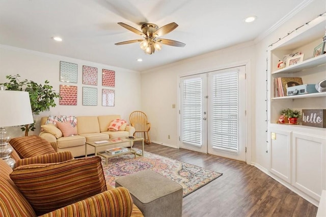 living room featuring ornamental molding and wood-type flooring