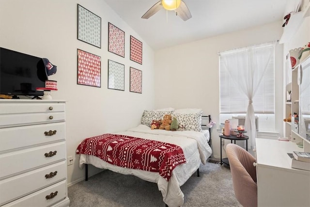 bedroom with lofted ceiling, carpet floors, and ceiling fan