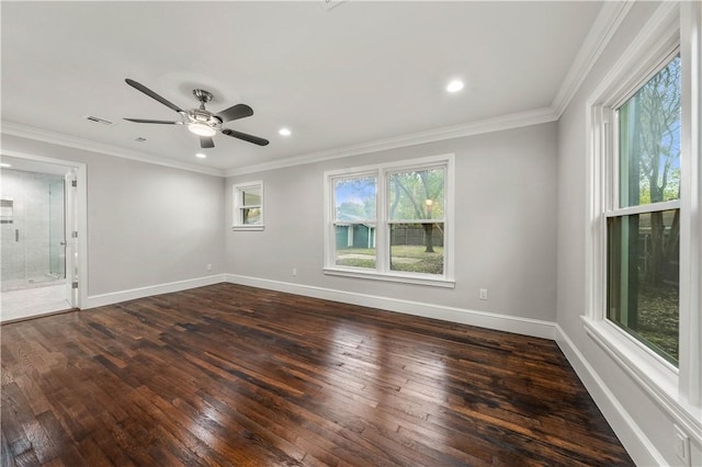 spare room with dark hardwood / wood-style floors, ceiling fan, and crown molding