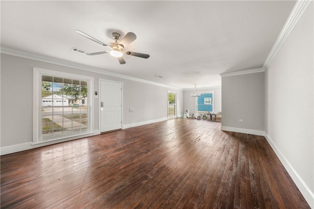 unfurnished living room with ornamental molding, ceiling fan with notable chandelier, and dark wood-type flooring